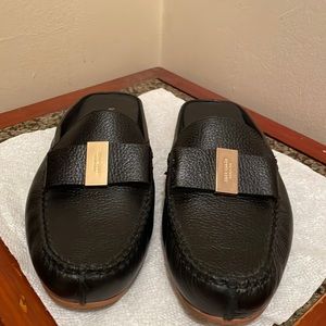 Kate Spade size 9 1/2 slip in mules in excellent condition.